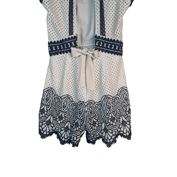Saylor Ivory & Navy M Lace Embroidered Romper Open Back & Ribbon Tie Detail - Picture 9 of 15